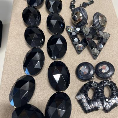 Black leather earrings and more