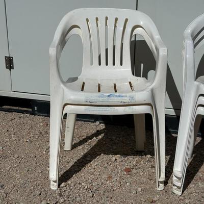 5 PLASTIC STACKING CHAIRS