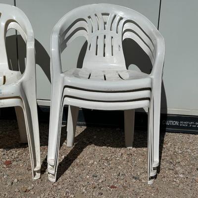 5 PLASTIC STACKING CHAIRS