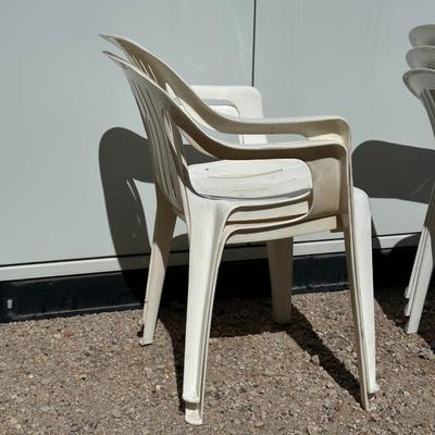 5 PLASTIC STACKING CHAIRS