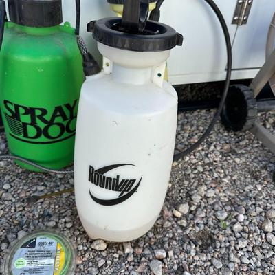HOSE REEL, WEED SPRAYER AND SPREADER