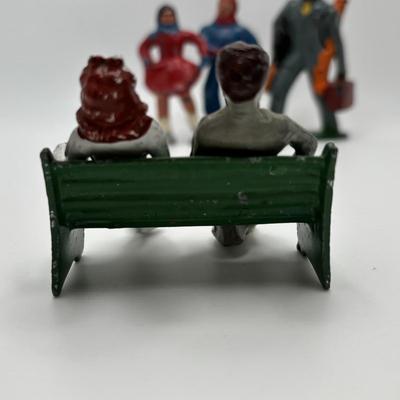 Lot 244: Vintage Barclay Manoil Lead Winter Figurines & Train Porter