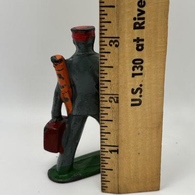 Lot 244: Vintage Barclay Manoil Lead Winter Figurines & Train Porter