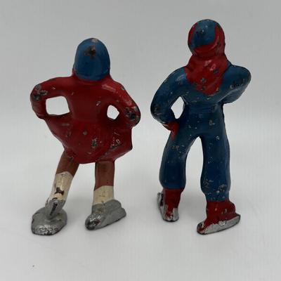 Lot 244: Vintage Barclay Manoil Lead Winter Figurines & Train Porter