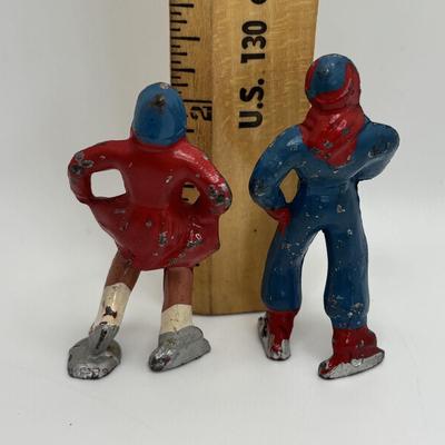 Lot 244: Vintage Barclay Manoil Lead Winter Figurines & Train Porter