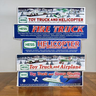 LOT 155B: Collection of Boxed Hess Trucks