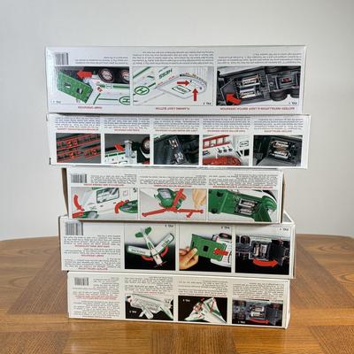 LOT 155B: Collection of Boxed Hess Trucks