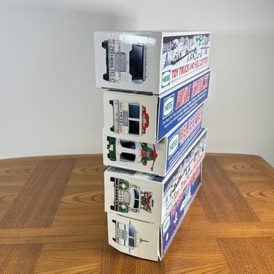 LOT 155B: Collection of Boxed Hess Trucks