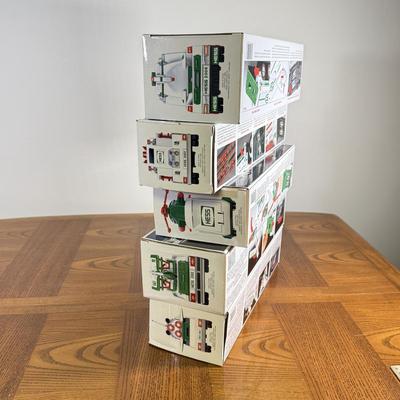 LOT 155B: Collection of Boxed Hess Trucks