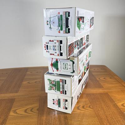 LOT 155B: Collection of Boxed Hess Trucks
