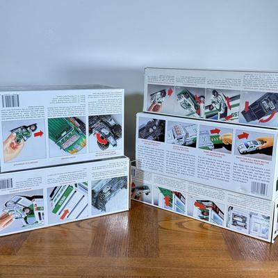 LOT 156B: Five Boxed Hess Vehicles