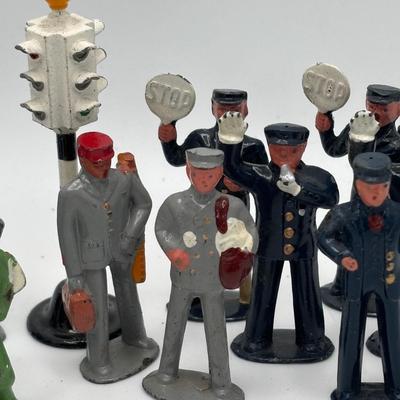 LOT 245: Lesney Esso Gas Pump, Britains Farm Figurines, Barclay Newspaper Seller & More