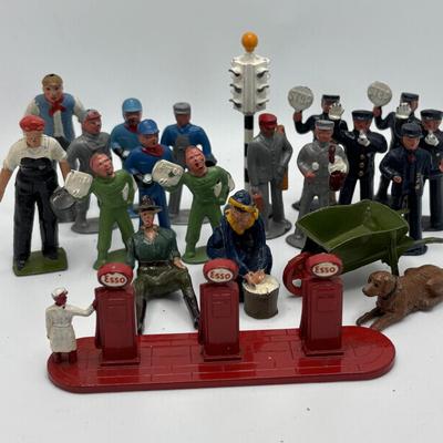 LOT 245: Lesney Esso Gas Pump, Britains Farm Figurines, Barclay Newspaper Seller & More