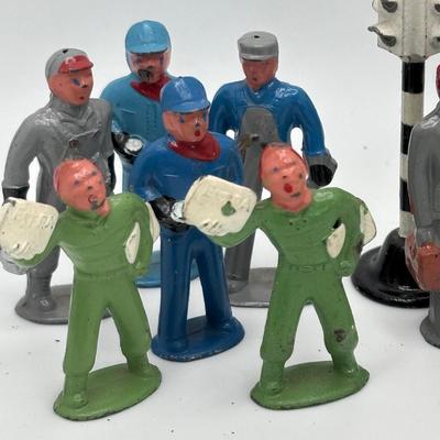 LOT 245: Lesney Esso Gas Pump, Britains Farm Figurines, Barclay Newspaper Seller & More