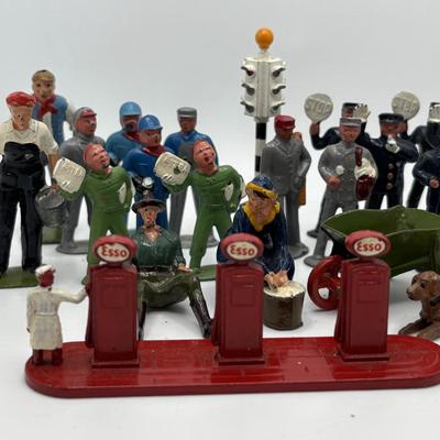LOT 245: Lesney Esso Gas Pump, Britains Farm Figurines, Barclay Newspaper Seller & More