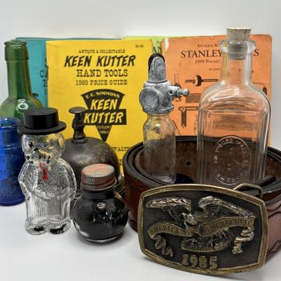 LOT 248: America Remembered 1985 Park City Belt Buckle, Pin Striping Tool, Glass Dog Perfume Bottle & More