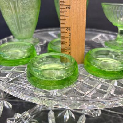 LOT 258: Vintage Uranuim Glass Furniture Casters, Sherbet Dish & Footed Tumblers along with a Crystal Cake Stand & Divided...