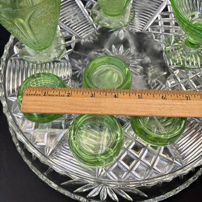 LOT 258: Vintage Uranuim Glass Furniture Casters, Sherbet Dish & Footed Tumblers along with a Crystal Cake Stand & Divided...