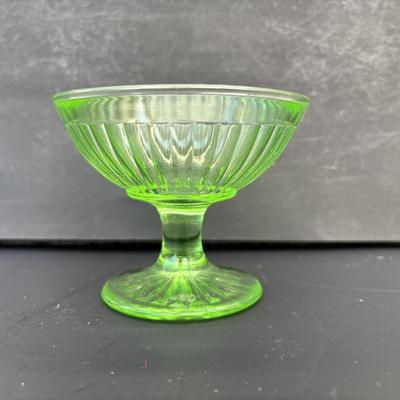 LOT 258: Vintage Uranuim Glass Furniture Casters, Sherbet Dish & Footed Tumblers along with a Crystal Cake Stand & Divided...