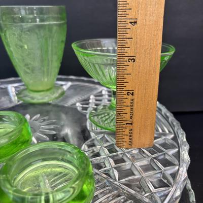 LOT 258: Vintage Uranuim Glass Furniture Casters, Sherbet Dish & Footed Tumblers along with a Crystal Cake Stand & Divided...