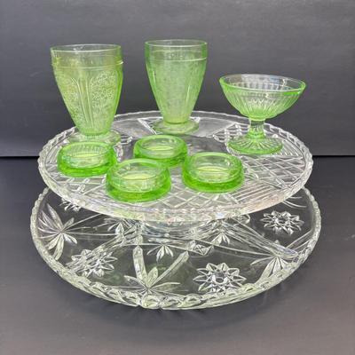 LOT 258: Vintage Uranuim Glass Furniture Casters, Sherbet Dish & Footed Tumblers along with a Crystal Cake Stand & Divided...