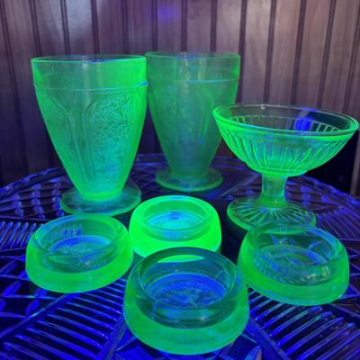 LOT 258: Vintage Uranuim Glass Furniture Casters, Sherbet Dish & Footed Tumblers along with a Crystal Cake Stand & Divided...