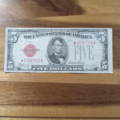 1928 E red Seal 5.00 bill