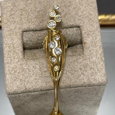 Gold tone and sparkly