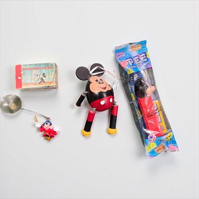 Sale Photo Thumbnail #55: Lot of 4 Walt Disney Mickey Mouse Treasures.  Includes Pez Disney Pack, Mickey Mouse Ornament handmade, Moving Picture Flip Book and window cling mickey mouse.