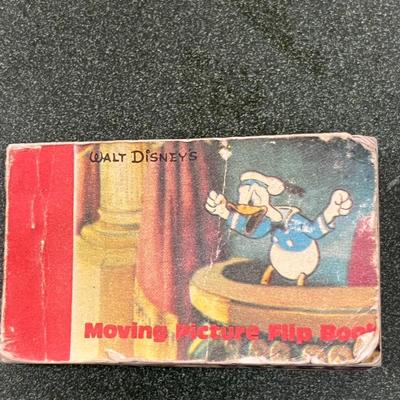 Sale Photo Thumbnail #49: Lot of 4 Walt Disney Mickey Mouse Treasures.  Includes Pez Disney Pack, Mickey Mouse Ornament handmade, Moving Picture Flip Book and window cling mickey mouse.