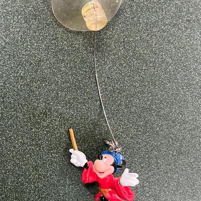 Sale Photo Thumbnail #51: Lot of 4 Walt Disney Mickey Mouse Treasures.  Includes Pez Disney Pack, Mickey Mouse Ornament handmade, Moving Picture Flip Book and window cling mickey mouse.