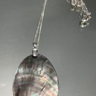 Pearl and shell pendants on sterling chains