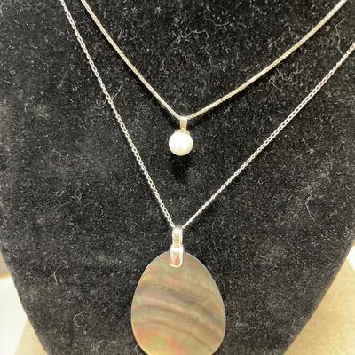Pearl and shell pendants on sterling chains