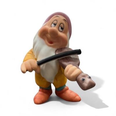 Sale Photo Thumbnail #76: Walt Disney Seven Dwarfs Figurines from Disney's Snow White and the Seven Dwarfs
Approximately 3.5" tall
