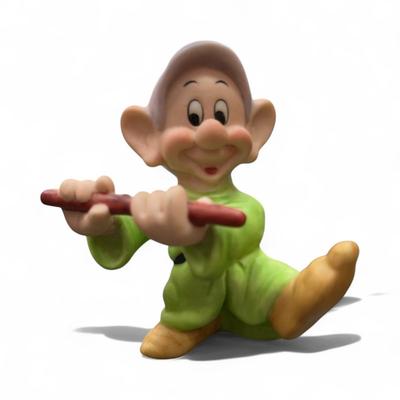 Sale Photo Thumbnail #81: Walt Disney Seven Dwarfs Figurines from Disney's Snow White and the Seven Dwarfs
Approximately 3.5" tall
