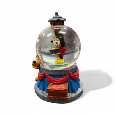 Sale Photo Thumbnail #90: Walt Disney Mickey Mouse drumming with Pluto Mini Snow Globe
Approximately 3.25" tall