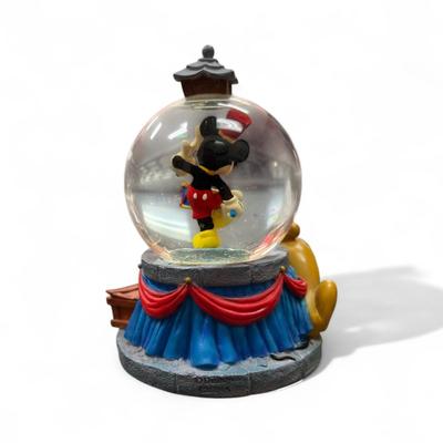 Sale Photo Thumbnail #91: Walt Disney Mickey Mouse drumming with Pluto Mini Snow Globe
Approximately 3.25" tall