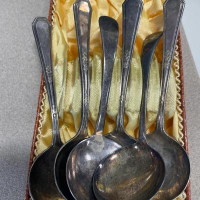 Brown stoneware vase and silver plate spoons