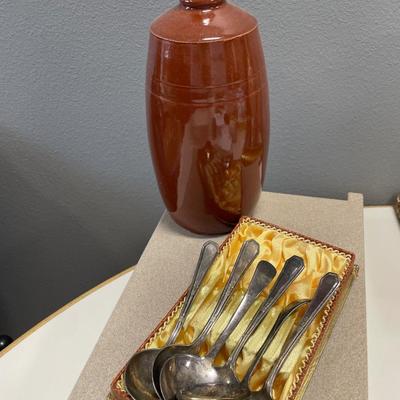 Brown stoneware vase and silver plate spoons