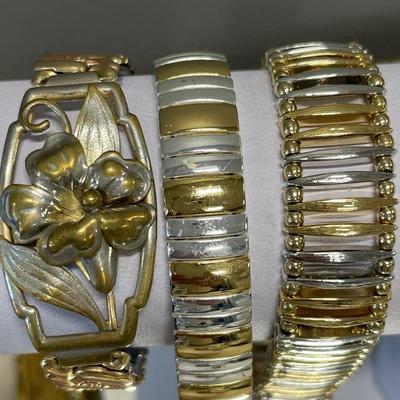 3 stretch gold and silver tone bracelets
