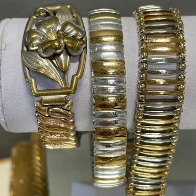 3 stretch gold and silver tone bracelets