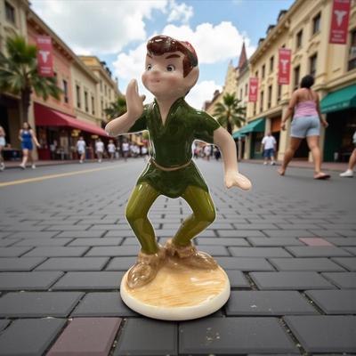Sale Photo Thumbnail #105: Walt Disney Peter Pan Ceramic Figurine.  Approximately 5" tall