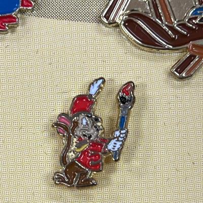 Sale Photo Thumbnail #121: Walt Disney World 2000 Cast Holiday Celebration Pin Set Includes 5 Pins in Wooden Box  Includes Dumbo, Donald Duck, Goofy, Mickey Mouse and Pluto, and Timothy Mouse