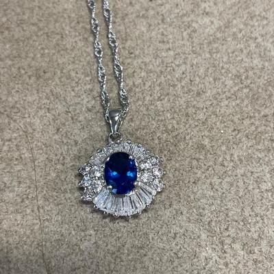 Blue edge enamel pin and blue sparkle necklace