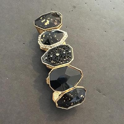 Sale Photo Thumbnail #162: Beautiful, golden and black fashion, statement, stretchy bracelet. Please see attached photos.