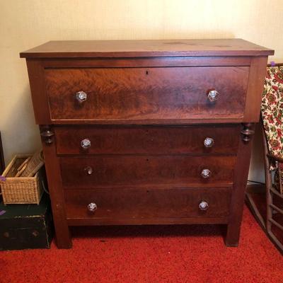 Sale Photo Thumbnail #41: Wooden chest of drawers with glass drawer pulls