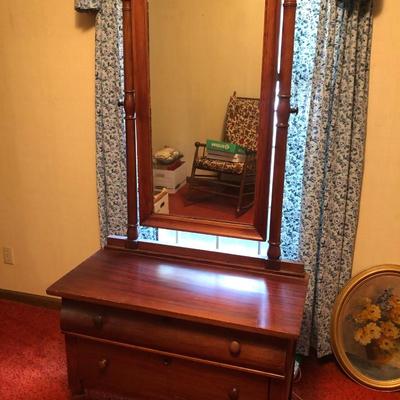Sale Photo Thumbnail #46: Wooden dresser on rolling casters with tilt-able attached mirror