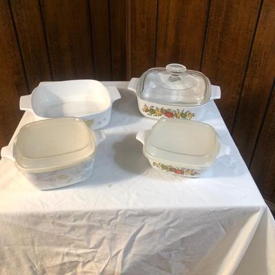 Sale Photo Thumbnail #73: Various sizes and designs of Corning Ware with glass and plastic lids