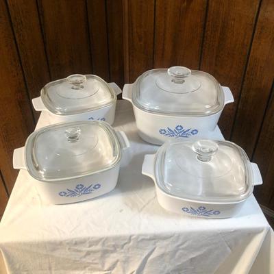 Sale Photo Thumbnail #71: Various sizes and designs of Corning Ware with glass and plastic lids