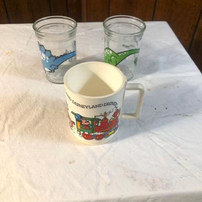 Sale Photo Thumbnail #81: Disney World collectible mug and glass Welch’s juice glasses with cartoon dinosaur art